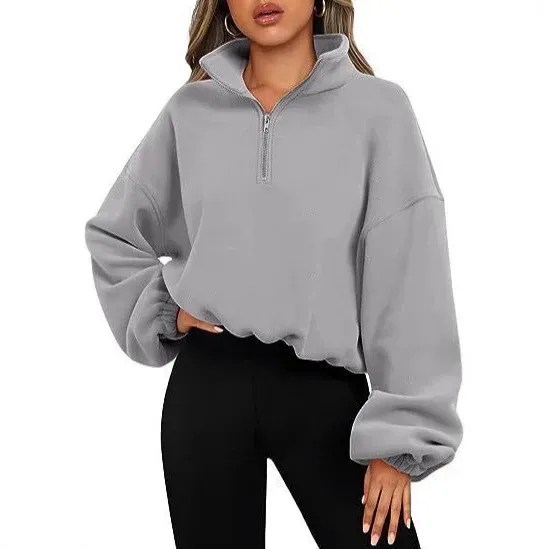 Damen kurz geschnittenes Halbzip-Sweatshirt mit hohem Stehkragen, Ballonärmeln und elastischem Saum – Avérine
